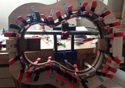 Kerf lining and side braces being glued to sides