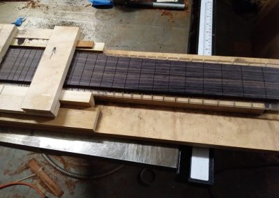 Fretboard being slotted