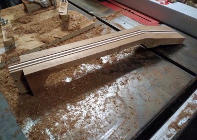 Neck block with tenon and reinforecement slots