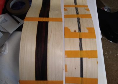 Binding and purfling has been bent to side profile