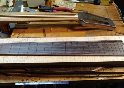 Fingerboard with purfling and binding - ready to be sanded and radiused
