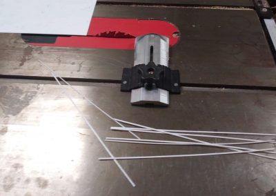 Teflon filler strips have been cut to size for use in the installation of top purfling