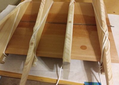 Back glue-up with Black Walnut center strip and black and yellow purfling strips