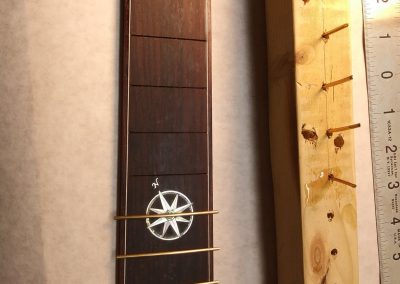 Frets installation in progress