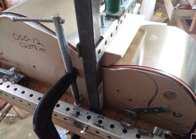 Mahogany sides are being bent in the side bender