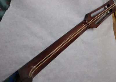 Sanding the neck for the next top coat