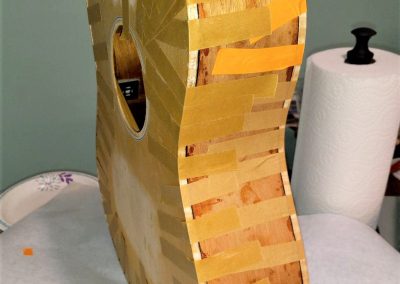 Binding on and glue setting up, side view