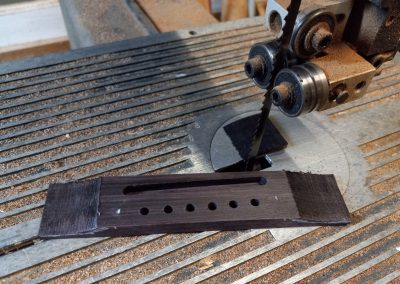 Cutting the wings on the briged before sanding