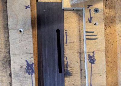 Routing the saddle pocket in the bridge