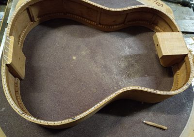 The top rim is marked to confirm when sanding is complete