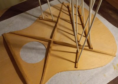 Tone bars and finger braces being glued